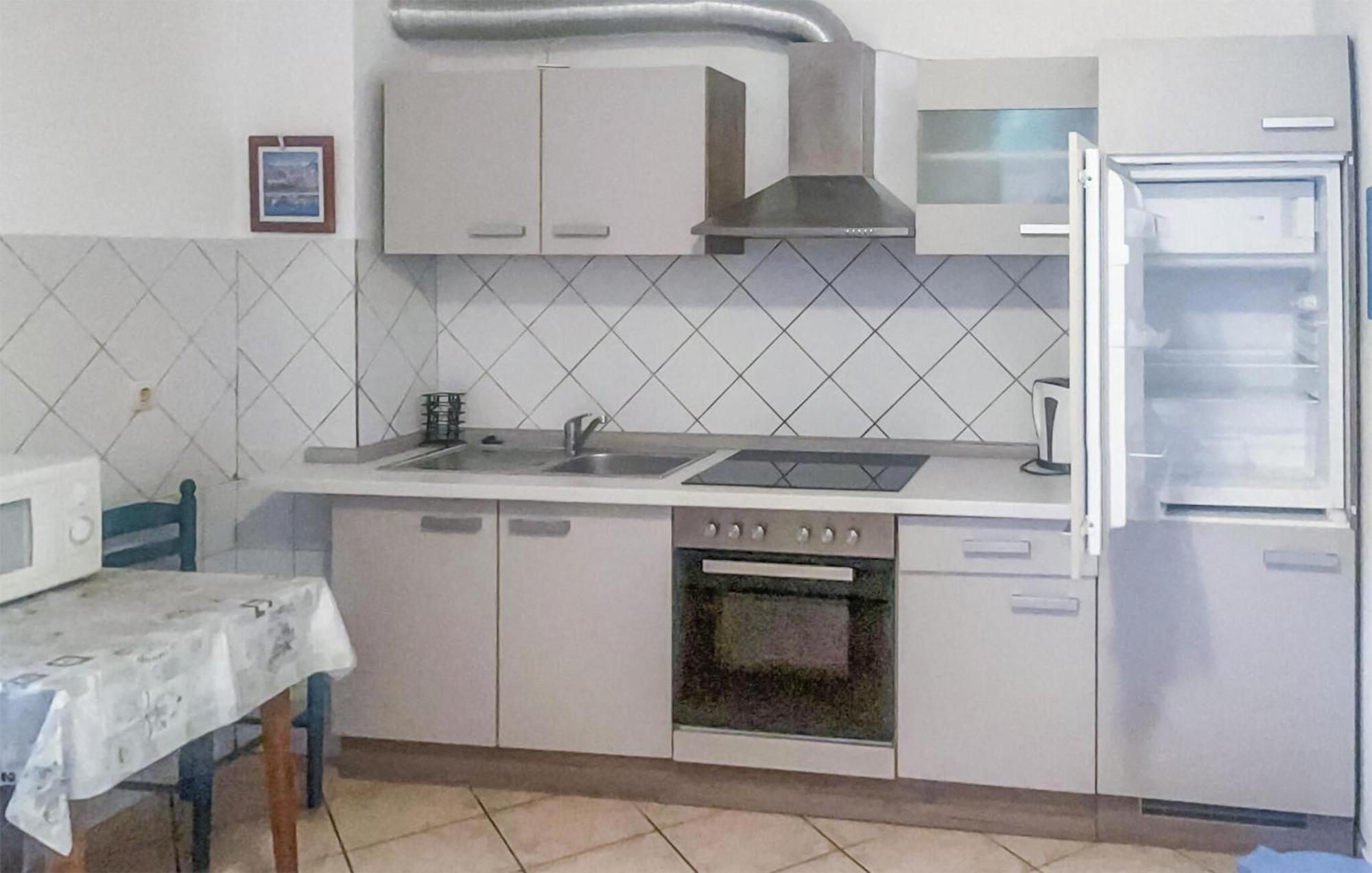 Awesome Apartment In Njivice With Kitchen Exterior photo